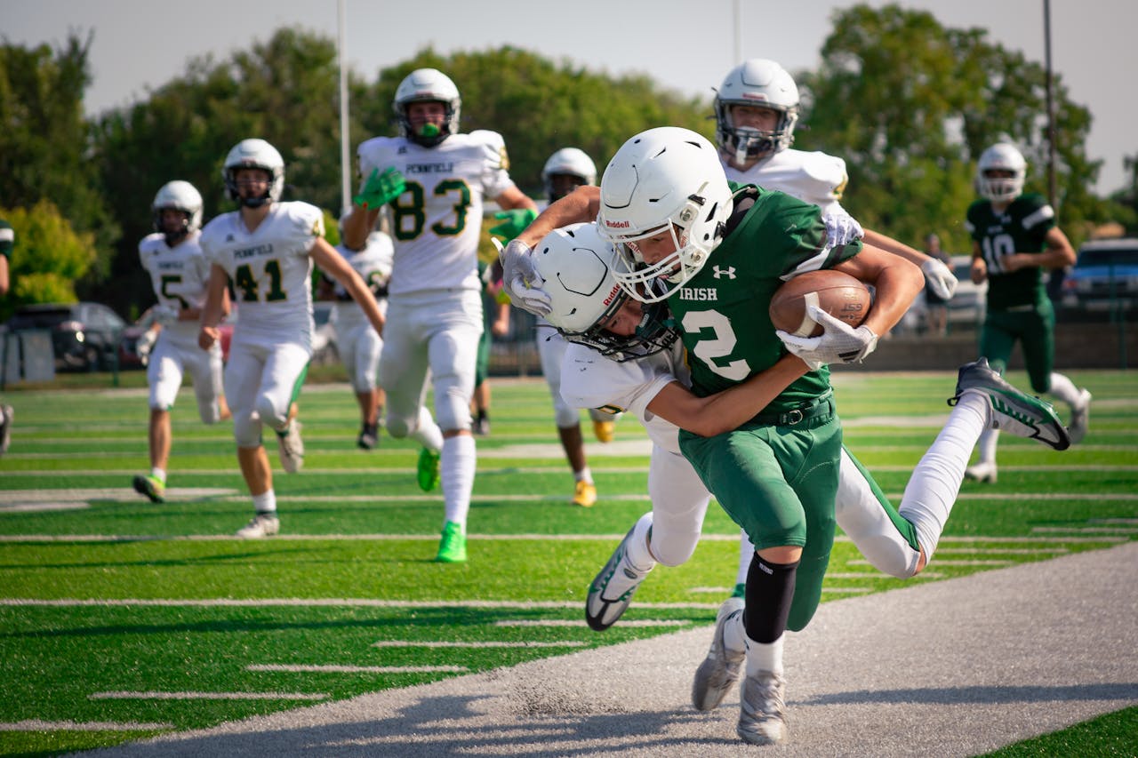 high school students playing American football