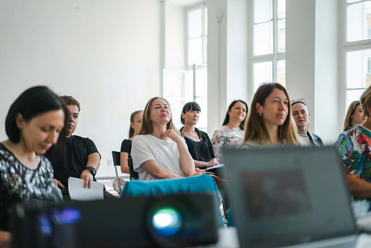 people listening to a presentation