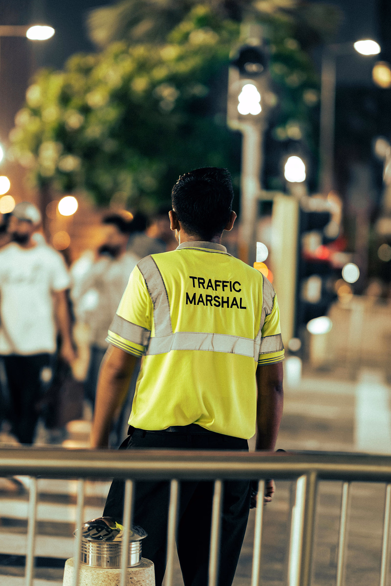 A traffic guard in the street
