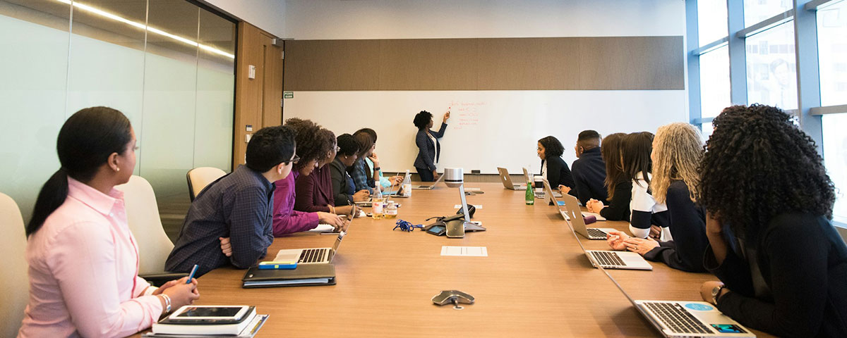 teachers listening to a presentation