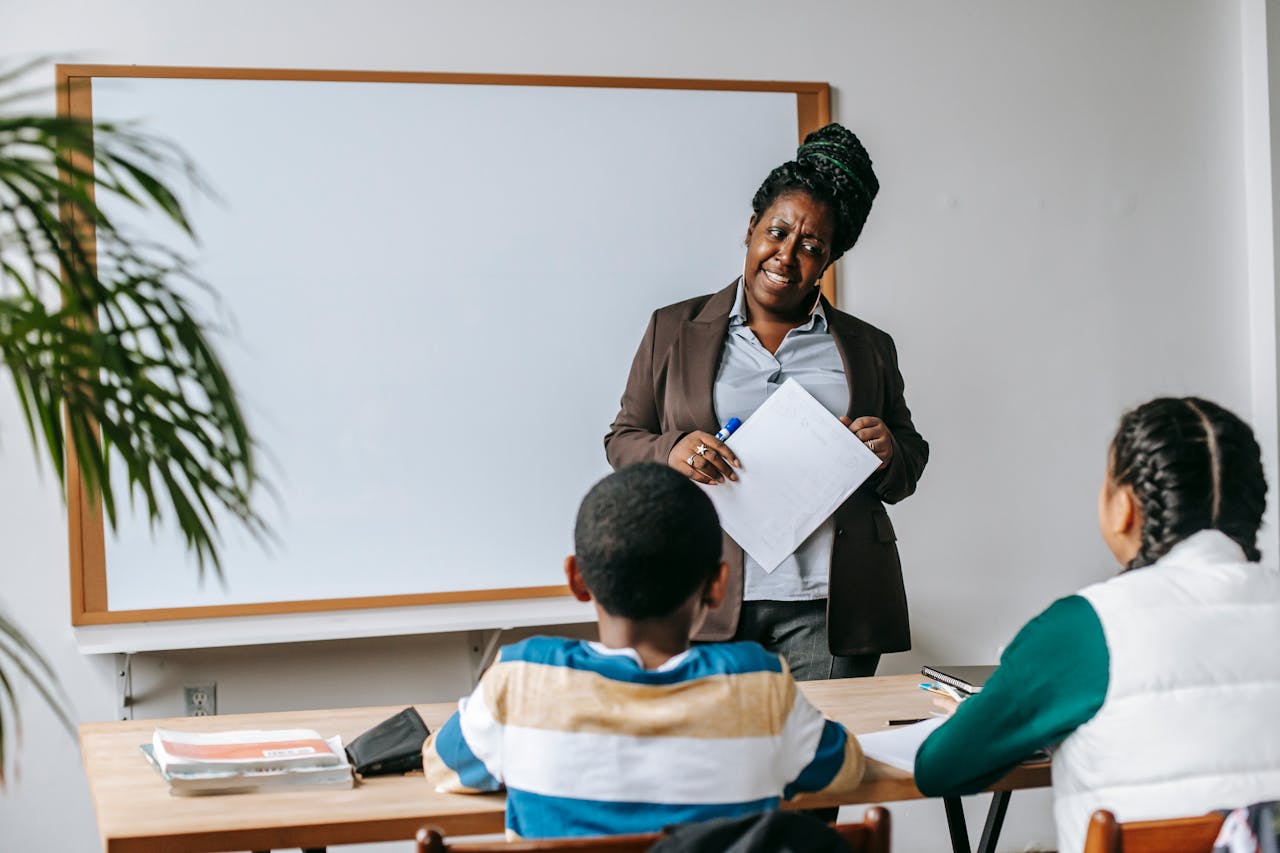 a teacher in front of a classroom