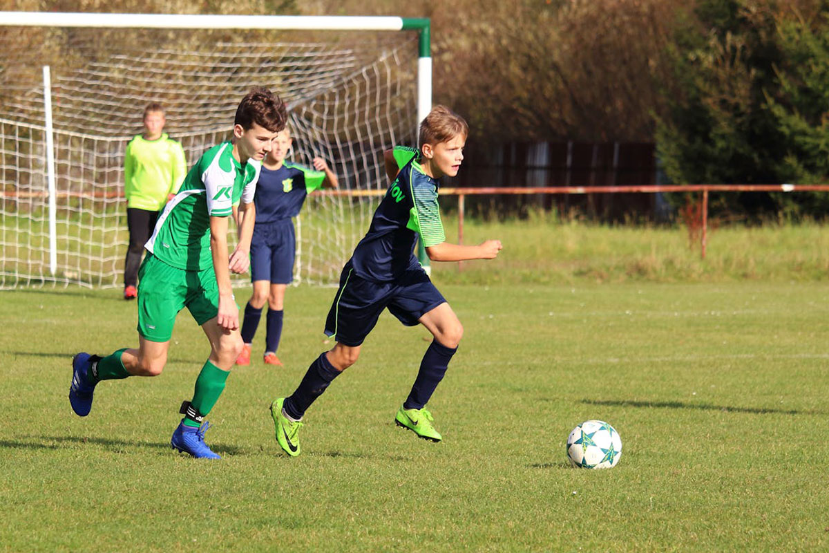 A group of boys playing soccer