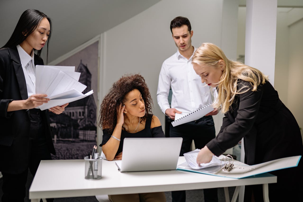 co-workers reviewing documents